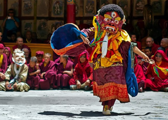 Chhamb Folk Dance performers in traditional masks and costumes