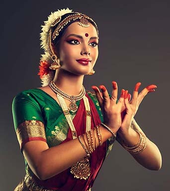 Traditional Bharatanatyam costume with silk saree and temple jewelry for Navratri performance