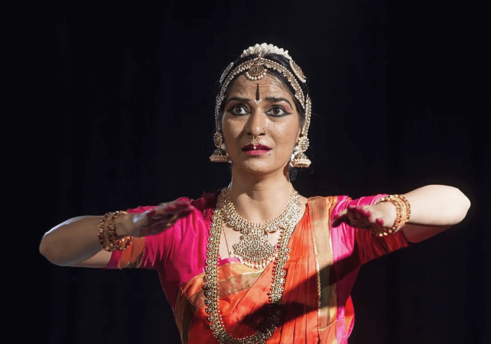 Bharatanatyam dancer performing classical Indian dance for Navratri celebrations
