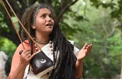 Toto Lokgeet folk singer performing